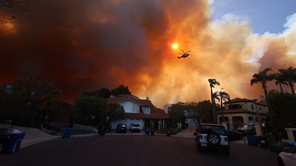 Wildfires Burn Through Pacific Palisades (Photos)