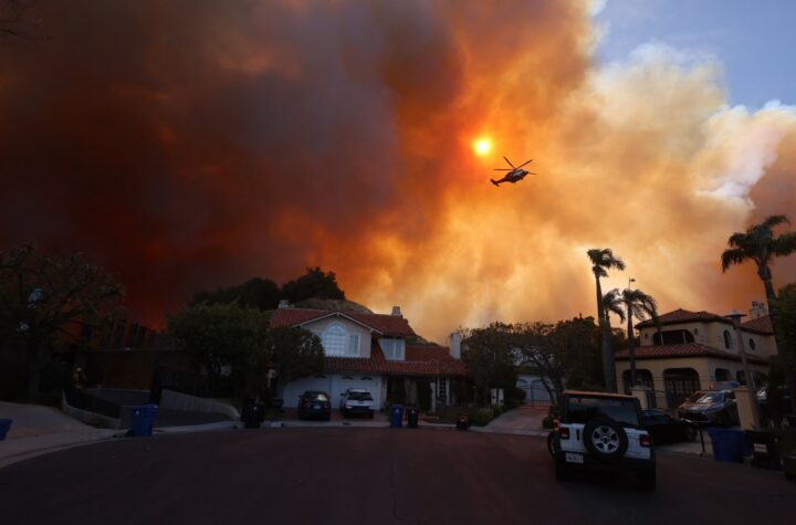 Wildfires Burn Through Pacific Palisades (Photos)